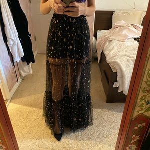 Black tulle maxi skirt with embellished gold stars